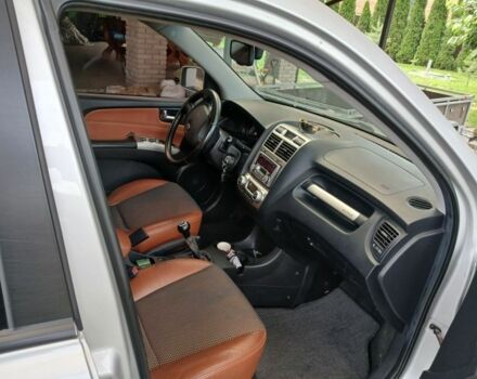 Серый Киа Sportage, объемом двигателя 2 л и пробегом 290 тыс. км за 7000 $, фото 4 на Automoto.ua