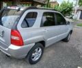 Серый Киа Sportage, объемом двигателя 2 л и пробегом 290 тыс. км за 7000 $, фото 2 на Automoto.ua