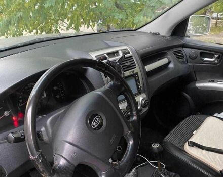 Серый Киа Sportage, объемом двигателя 2 л и пробегом 256 тыс. км за 5999 $, фото 4 на Automoto.ua
