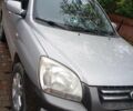 Серый Киа Sportage, объемом двигателя 2 л и пробегом 200 тыс. км за 6500 $, фото 4 на Automoto.ua