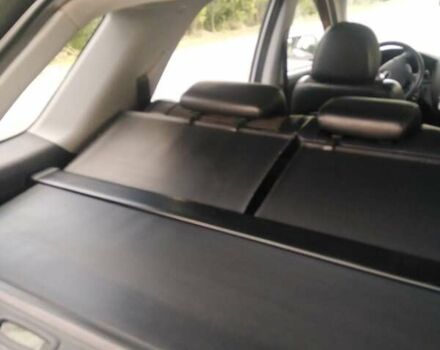 Серый Киа Sportage, объемом двигателя 2 л и пробегом 137 тыс. км за 8000 $, фото 4 на Automoto.ua