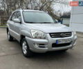 Серый Киа Sportage, объемом двигателя 2 л и пробегом 250 тыс. км за 7900 $, фото 1 на Automoto.ua