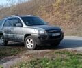Серый Киа Sportage, объемом двигателя 2 л и пробегом 165 тыс. км за 7900 $, фото 1 на Automoto.ua
