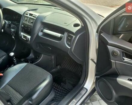 Серый Киа Sportage, объемом двигателя 2 л и пробегом 288 тыс. км за 6999 $, фото 32 на Automoto.ua