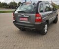 Серый Киа Sportage, объемом двигателя 2 л и пробегом 240 тыс. км за 6599 $, фото 1 на Automoto.ua