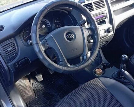 Серый Киа Sportage, объемом двигателя 1.98 л и пробегом 150 тыс. км за 7500 $, фото 22 на Automoto.ua