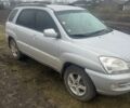 Серый Киа Sportage, объемом двигателя 2 л и пробегом 329 тыс. км за 4800 $, фото 1 на Automoto.ua