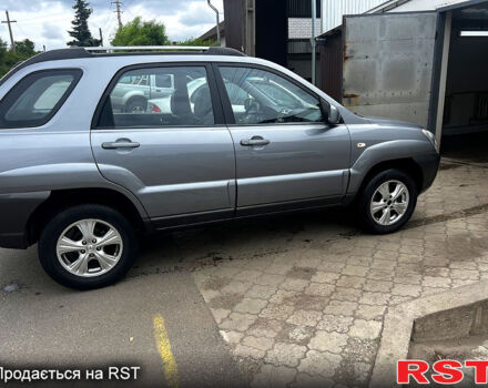 Серый Киа Sportage, объемом двигателя 2 л и пробегом 223 тыс. км за 8000 $, фото 1 на Automoto.ua