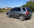 Серый Киа Sportage, объемом двигателя 1.98 л и пробегом 267 тыс. км за 8600 $, фото 4 на Automoto.ua
