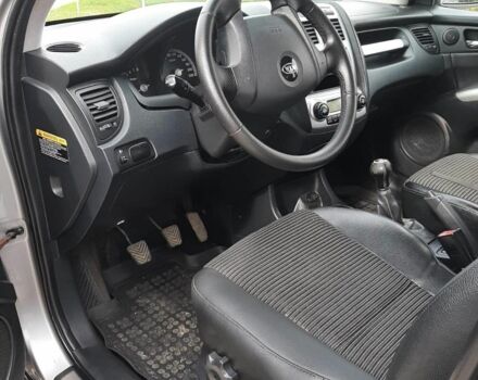 Серый Киа Sportage, объемом двигателя 2 л и пробегом 240 тыс. км за 6599 $, фото 10 на Automoto.ua