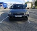 Серый Киа Sportage, объемом двигателя 2 л и пробегом 320 тыс. км за 7400 $, фото 1 на Automoto.ua