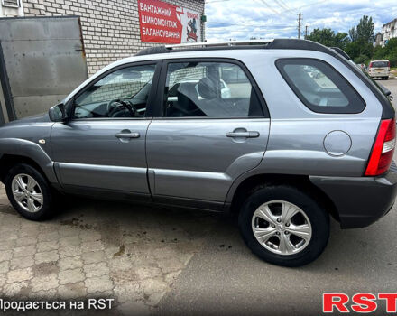 Серый Киа Sportage, объемом двигателя 2 л и пробегом 223 тыс. км за 8000 $, фото 5 на Automoto.ua