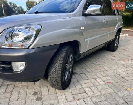 Серый Киа Sportage, объемом двигателя 2 л и пробегом 288 тыс. км за 6999 $, фото 2 на Automoto.ua