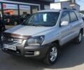 Серый Киа Sportage, объемом двигателя 2 л и пробегом 235 тыс. км за 7000 $, фото 1 на Automoto.ua