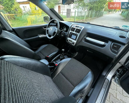 Серый Киа Sportage, объемом двигателя 2 л и пробегом 215 тыс. км за 7999 $, фото 39 на Automoto.ua
