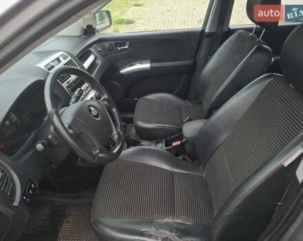 Серый Киа Sportage, объемом двигателя 2 л и пробегом 295 тыс. км за 8500 $, фото 7 на Automoto.ua