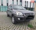 Серый Киа Sportage, объемом двигателя 2 л и пробегом 295 тыс. км за 8500 $, фото 1 на Automoto.ua