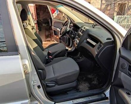 Серый Киа Sportage, объемом двигателя 2 л и пробегом 200 тыс. км за 8500 $, фото 6 на Automoto.ua