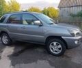 Серый Киа Sportage, объемом двигателя 2 л и пробегом 181 тыс. км за 7699 $, фото 2 на Automoto.ua