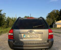 Серый Киа Sportage, объемом двигателя 2 л и пробегом 290 тыс. км за 7500 $, фото 14 на Automoto.ua