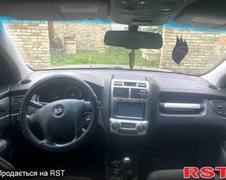 Серый Киа Sportage, объемом двигателя 2 л и пробегом 248 тыс. км за 7500 $, фото 4 на Automoto.ua