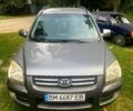 Серый Киа Sportage, объемом двигателя 2 л и пробегом 248 тыс. км за 7500 $, фото 1 на Automoto.ua