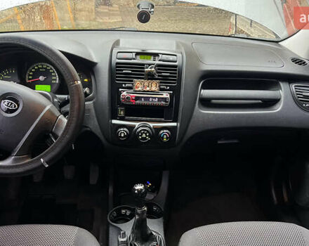 Серый Киа Sportage, объемом двигателя 2 л и пробегом 290 тыс. км за 7500 $, фото 18 на Automoto.ua