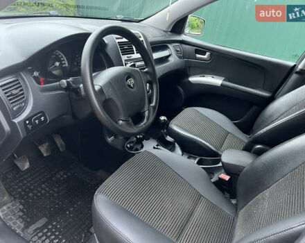 Серый Киа Sportage, объемом двигателя 2 л и пробегом 270 тыс. км за 6599 $, фото 12 на Automoto.ua