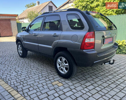 Серый Киа Sportage, объемом двигателя 2 л и пробегом 270 тыс. км за 6599 $, фото 3 на Automoto.ua