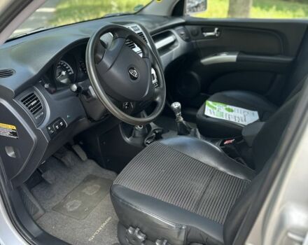 Серый Киа Sportage, объемом двигателя 2 л и пробегом 170 тыс. км за 8199 $, фото 7 на Automoto.ua