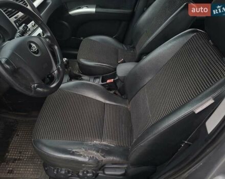 Серый Киа Sportage, объемом двигателя 2 л и пробегом 295 тыс. км за 8500 $, фото 17 на Automoto.ua