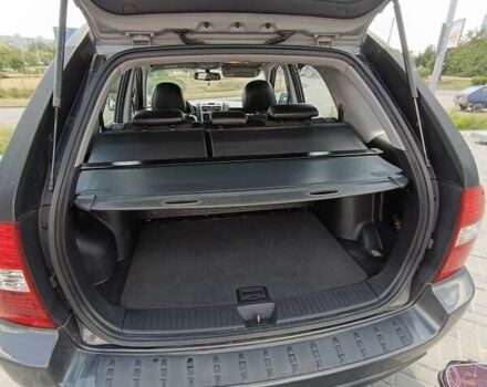 Серый Киа Sportage, объемом двигателя 2 л и пробегом 197 тыс. км за 8000 $, фото 4 на Automoto.ua