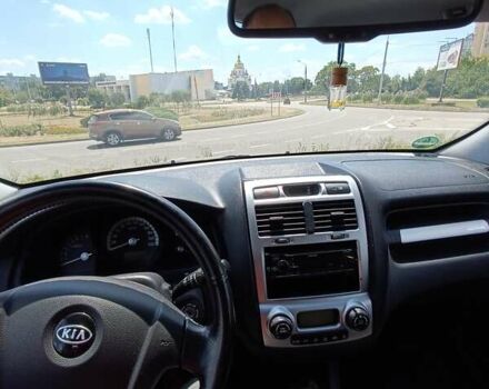 Серый Киа Sportage, объемом двигателя 2 л и пробегом 197 тыс. км за 8000 $, фото 14 на Automoto.ua