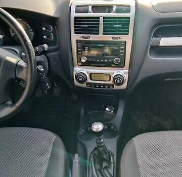 Серый Киа Sportage, объемом двигателя 2 л и пробегом 200 тыс. км за 8500 $, фото 2 на Automoto.ua