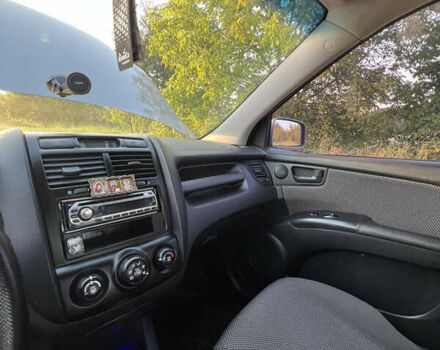Серый Киа Sportage, объемом двигателя 2 л и пробегом 290 тыс. км за 7500 $, фото 4 на Automoto.ua