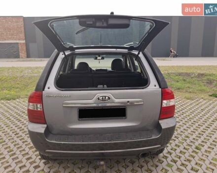 Серый Киа Sportage, объемом двигателя 2 л и пробегом 295 тыс. км за 8500 $, фото 3 на Automoto.ua