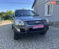 Серый Киа Sportage, объемом двигателя 2 л и пробегом 270 тыс. км за 6599 $, фото 1 на Automoto.ua
