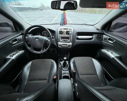 Серый Киа Sportage, объемом двигателя 2 л и пробегом 218 тыс. км за 8500 $, фото 30 на Automoto.ua