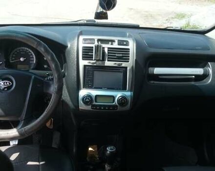 Серый Киа Sportage, объемом двигателя 2 л и пробегом 320 тыс. км за 6500 $, фото 4 на Automoto.ua