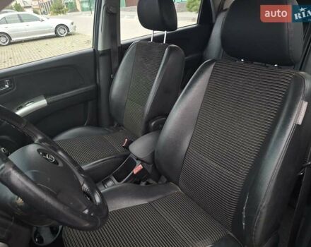 Серый Киа Sportage, объемом двигателя 2 л и пробегом 295 тыс. км за 8500 $, фото 12 на Automoto.ua