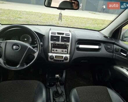 Серый Киа Sportage, объемом двигателя 2 л и пробегом 295 тыс. км за 8500 $, фото 23 на Automoto.ua