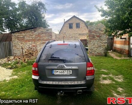 Серый Киа Sportage, объемом двигателя 2 л и пробегом 248 тыс. км за 7500 $, фото 1 на Automoto.ua