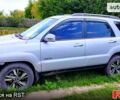 Серый Киа Sportage, объемом двигателя 2 л и пробегом 200 тыс. км за 7000 $, фото 1 на Automoto.ua