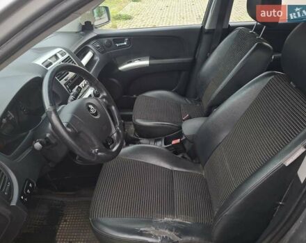 Серый Киа Sportage, объемом двигателя 2 л и пробегом 295 тыс. км за 8500 $, фото 9 на Automoto.ua