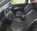 Серый Киа Sportage, объемом двигателя 2 л и пробегом 295 тыс. км за 8500 $, фото 9 на Automoto.ua