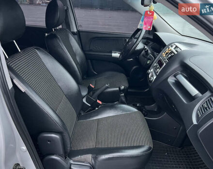 Серый Киа Sportage, объемом двигателя 2 л и пробегом 218 тыс. км за 8500 $, фото 26 на Automoto.ua