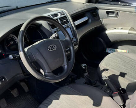 Серый Киа Sportage, объемом двигателя 2 л и пробегом 150 тыс. км за 7750 $, фото 9 на Automoto.ua
