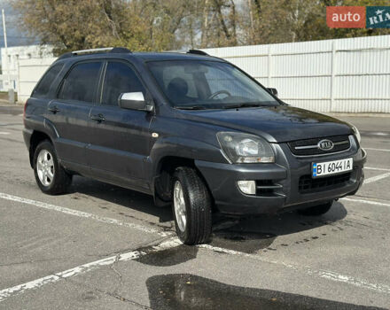 Серый Киа Sportage, объемом двигателя 2 л и пробегом 250 тыс. км за 7500 $, фото 2 на Automoto.ua
