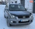 Серый Киа Sportage, объемом двигателя 2 л и пробегом 235 тыс. км за 6999 $, фото 2 на Automoto.ua