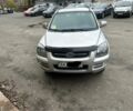 Сірий Кіа Sportage, об'ємом двигуна 2 л та пробігом 124 тис. км за 8300 $, фото 1 на Automoto.ua